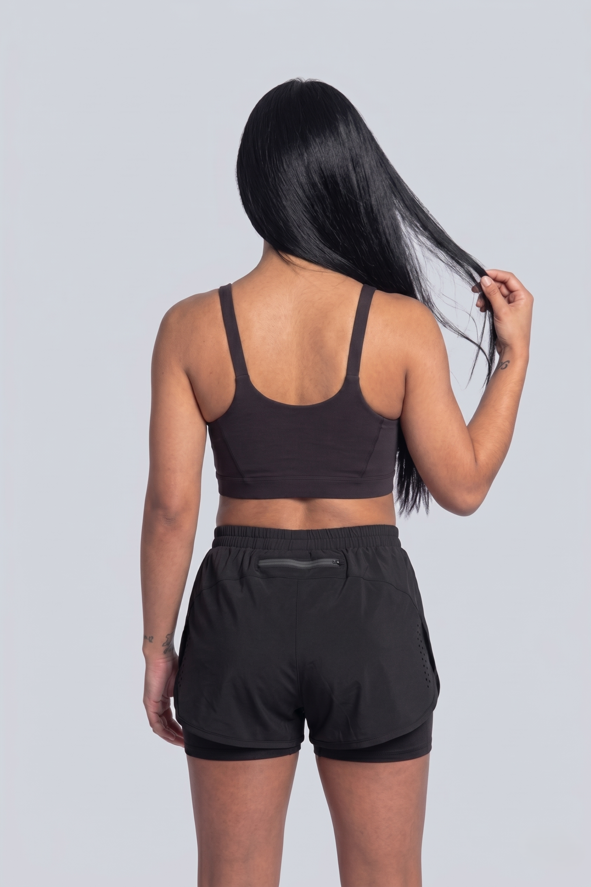 Short Running Deportivo Mujer Línea Giro con Boxer Interno y Bolsillos