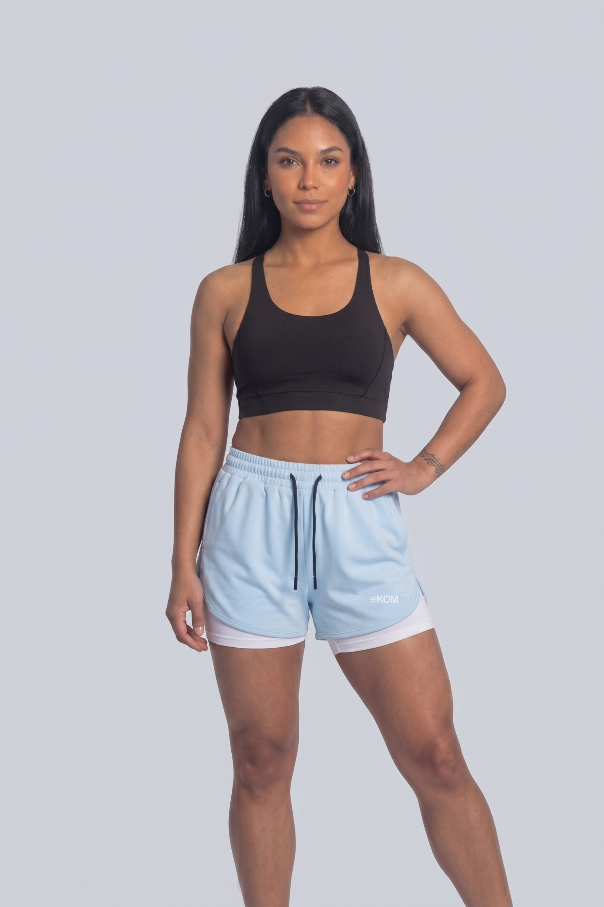 Short Running Deportivo Mujer Línea Giro con Boxer Interno y Bolsillos