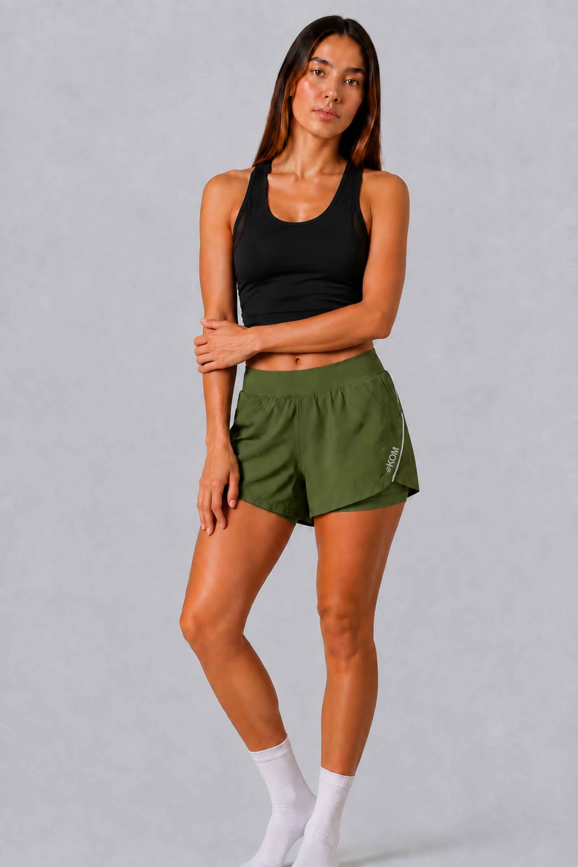 Short Running Deportivo Mujer Línea Giro PLUS con Boxer Interno y Bolsillos