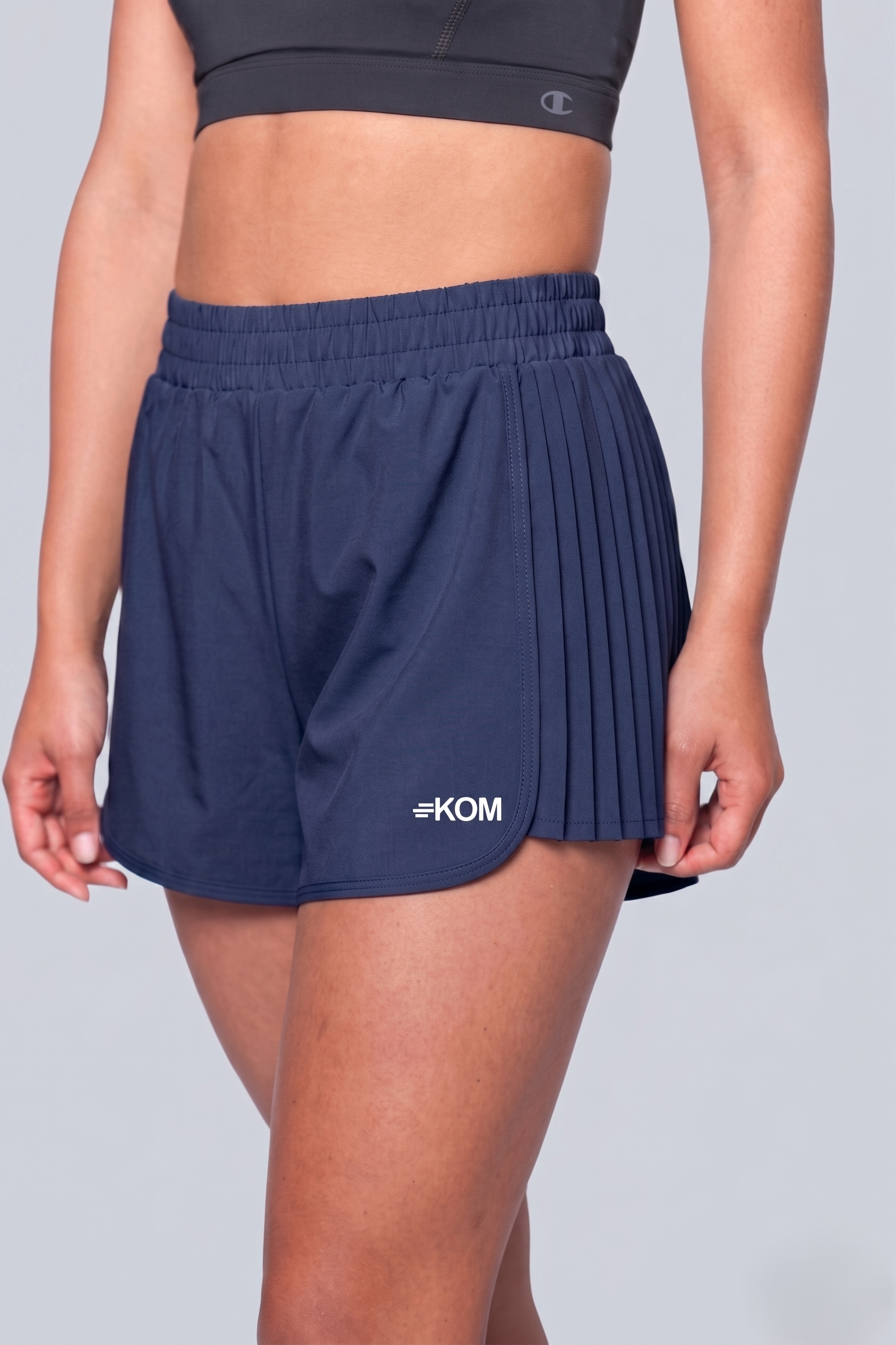 Short Running Deportivo Mujer Línea Tour con Boxer Interno y Bolsillo