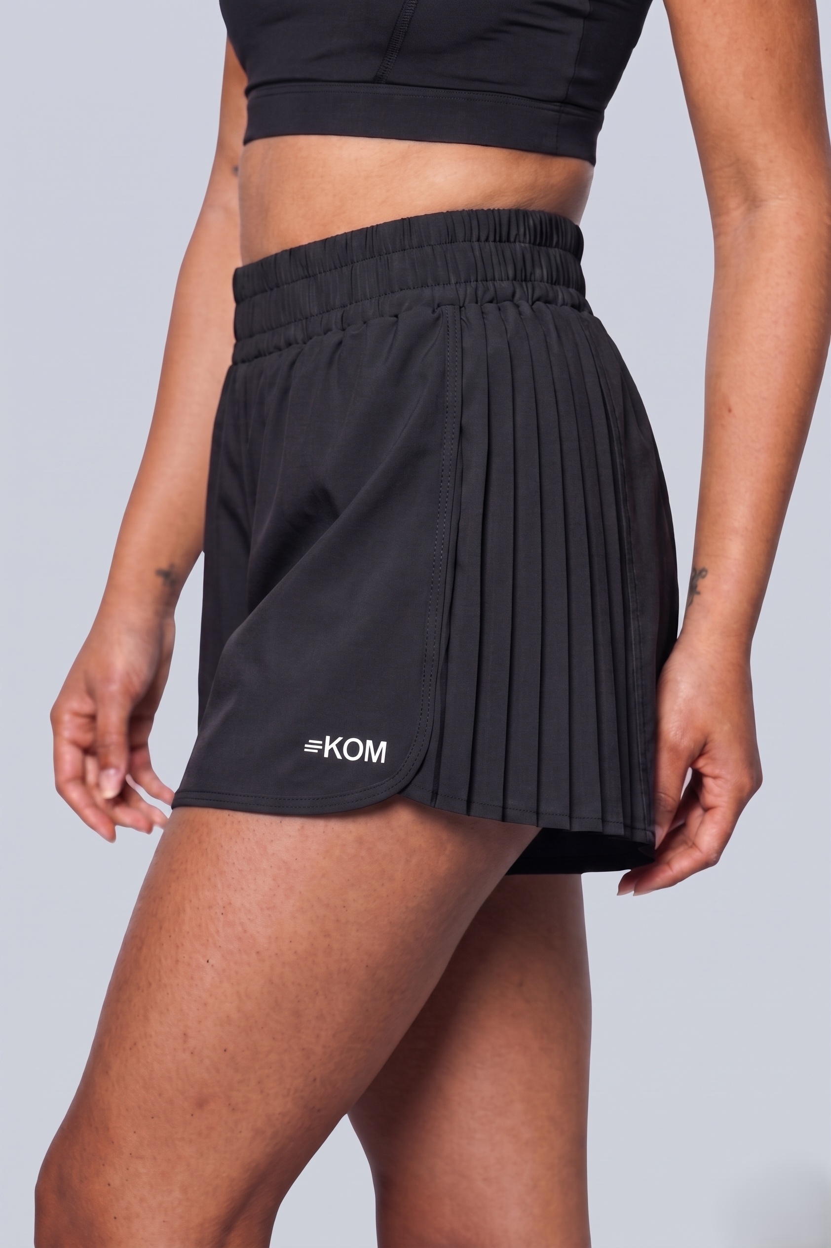 Short Running Deportivo Mujer Línea Tour con Boxer Interno y Bolsillo