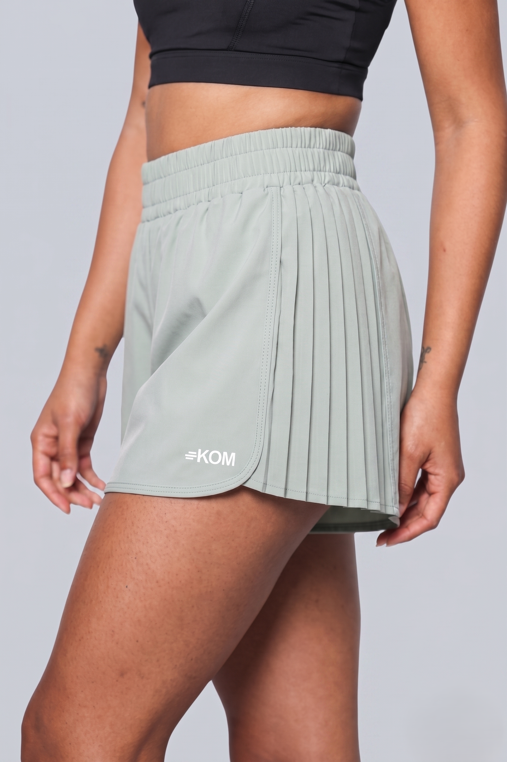 Short Running Deportivo Mujer Línea Tour con Boxer Interno y Bolsillo