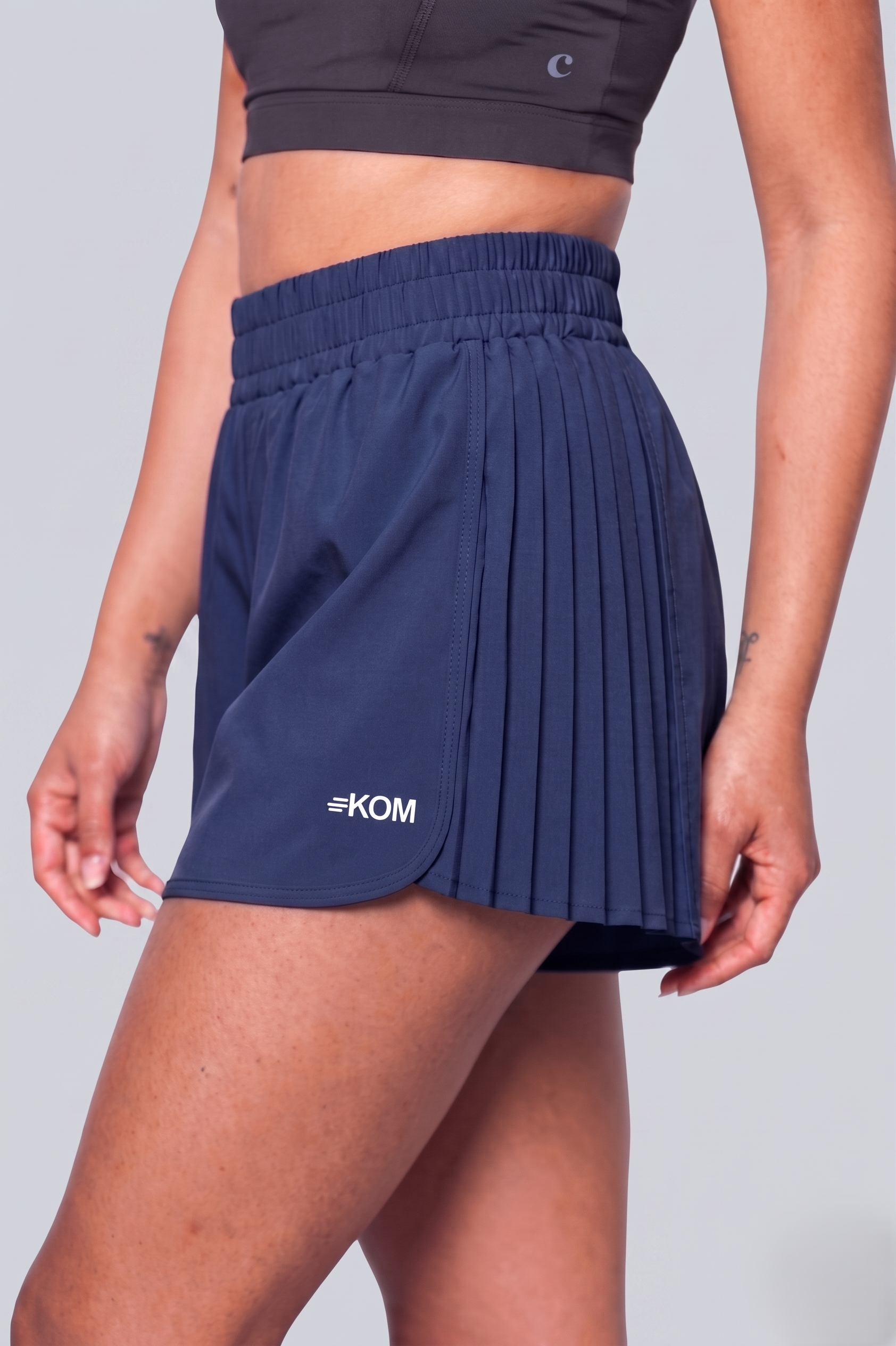 Short Running Deportivo Mujer Línea Tour con Boxer Interno y Bolsillo