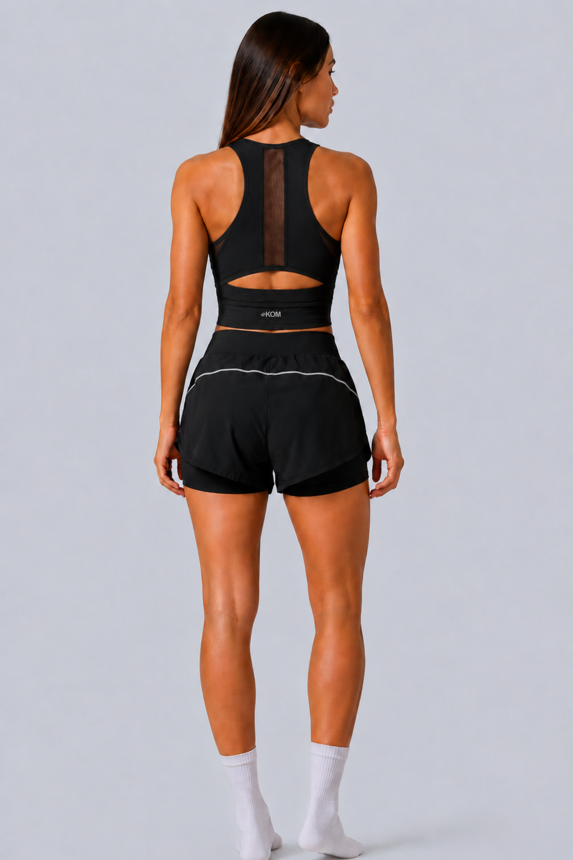 Short Running Deportivo Mujer Línea Giro PLUS con Boxer Interno y Bolsillos