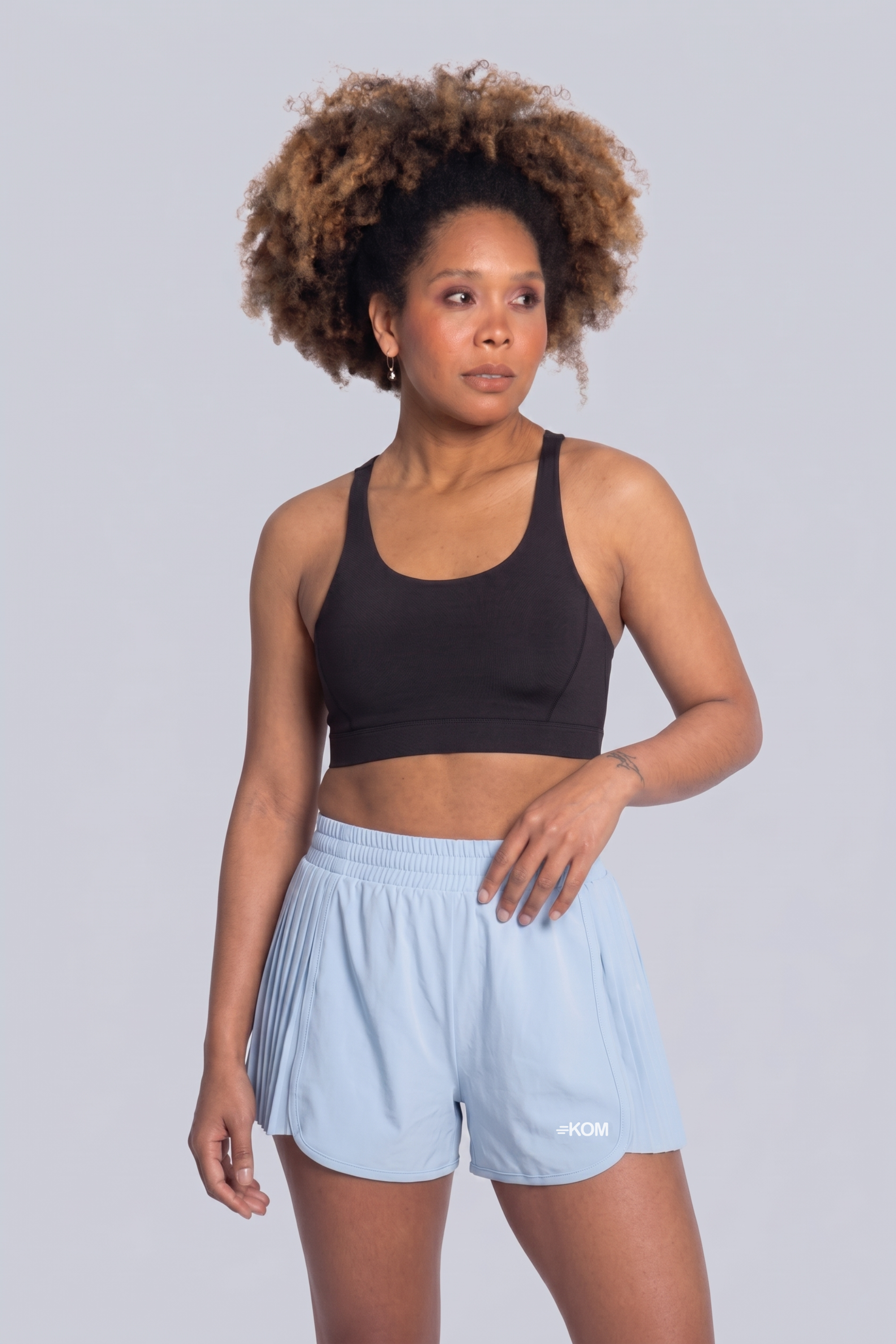 Short Running Deportivo Mujer Línea Tour con Boxer Interno y Bolsillo