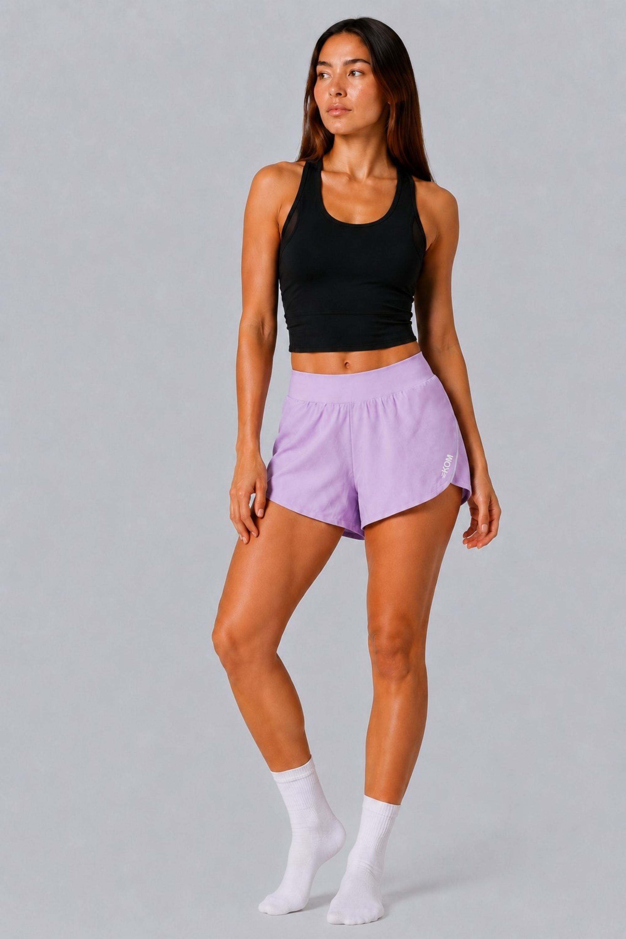 Short Running Deportivo Mujer Línea Giro PLUS con Boxer Interno y Bolsillos