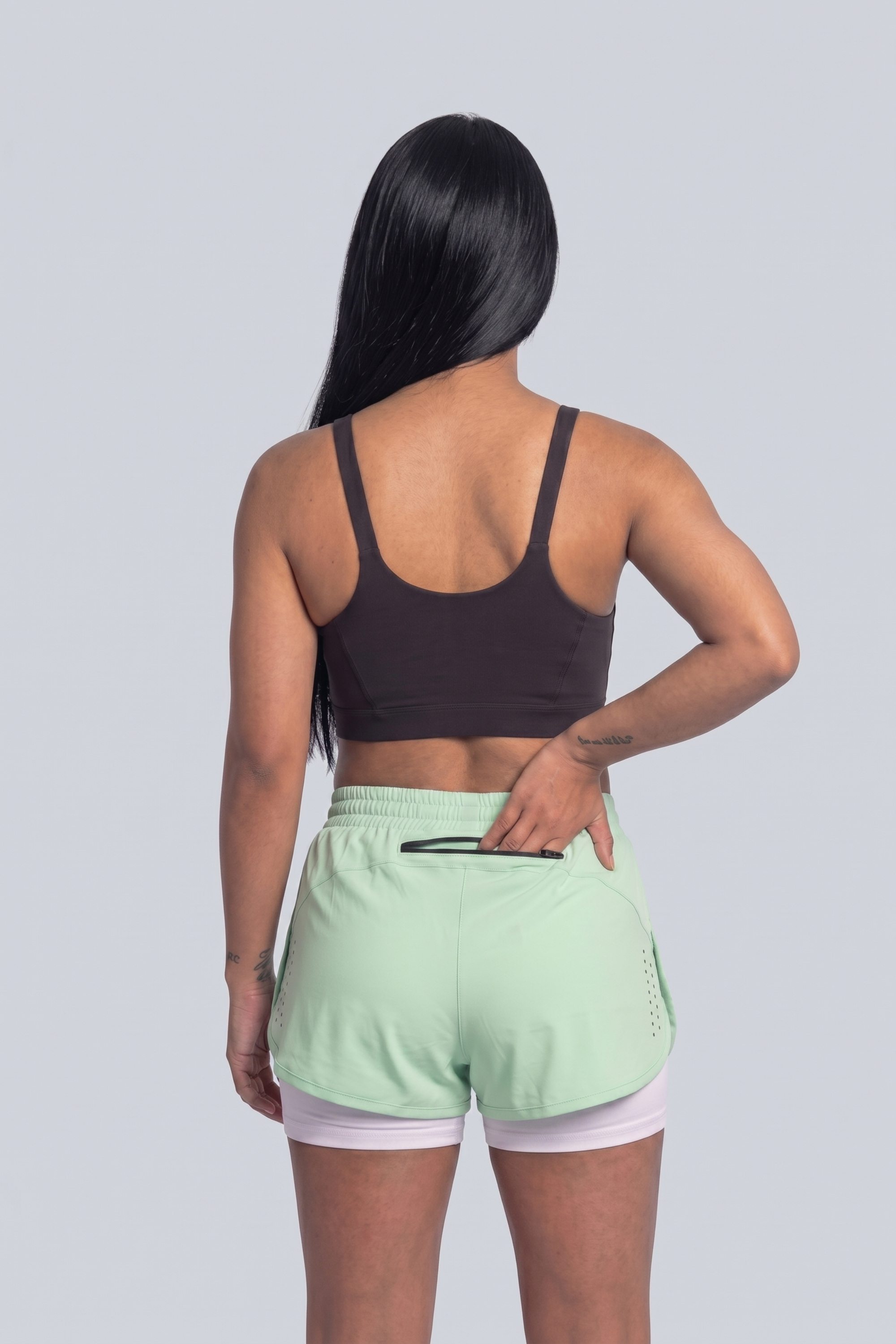 Short Running Deportivo Mujer Línea Giro con Boxer Interno y Bolsillos
