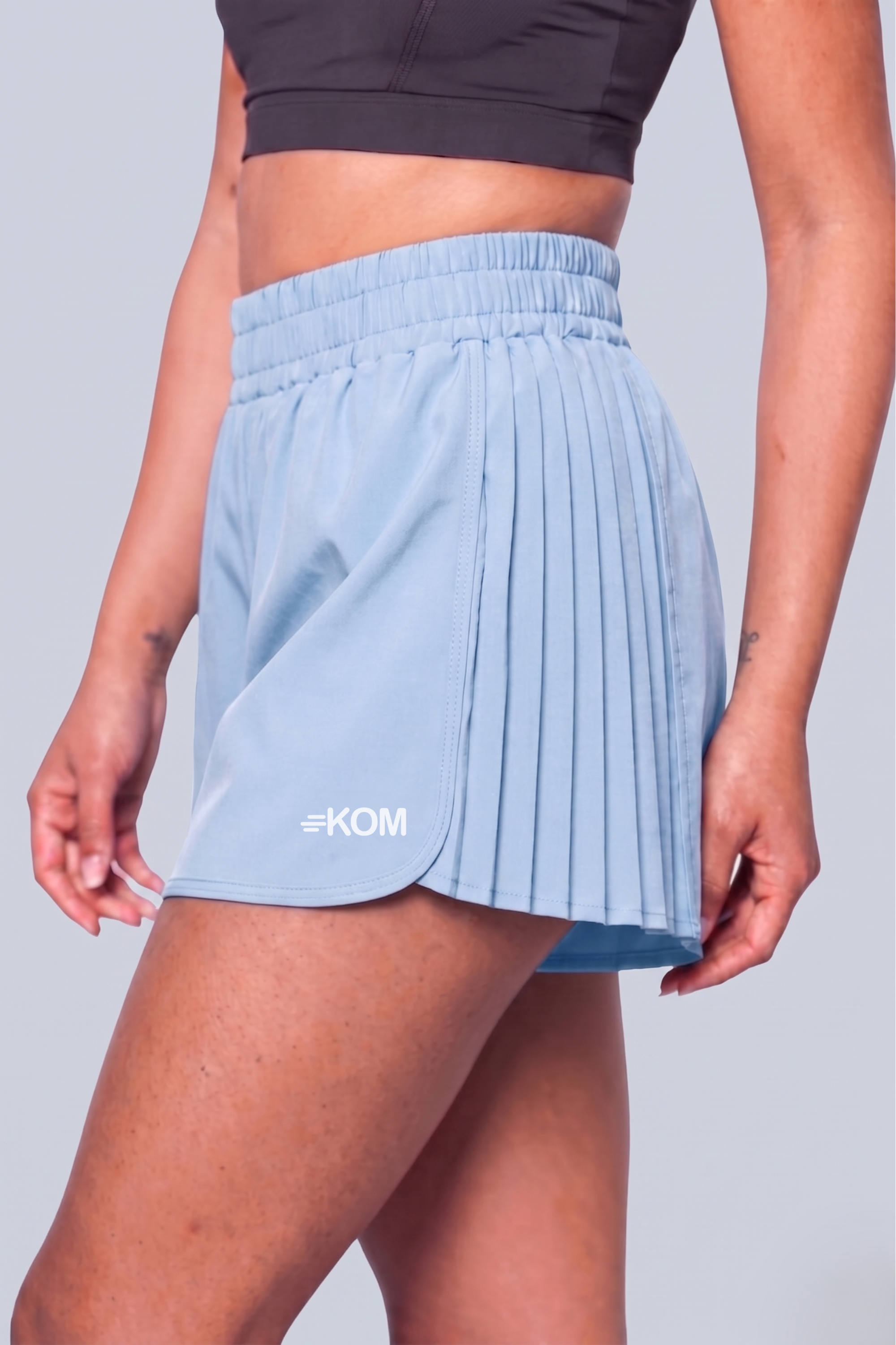 Short Running Deportivo Mujer Línea Tour con Boxer Interno y Bolsillo