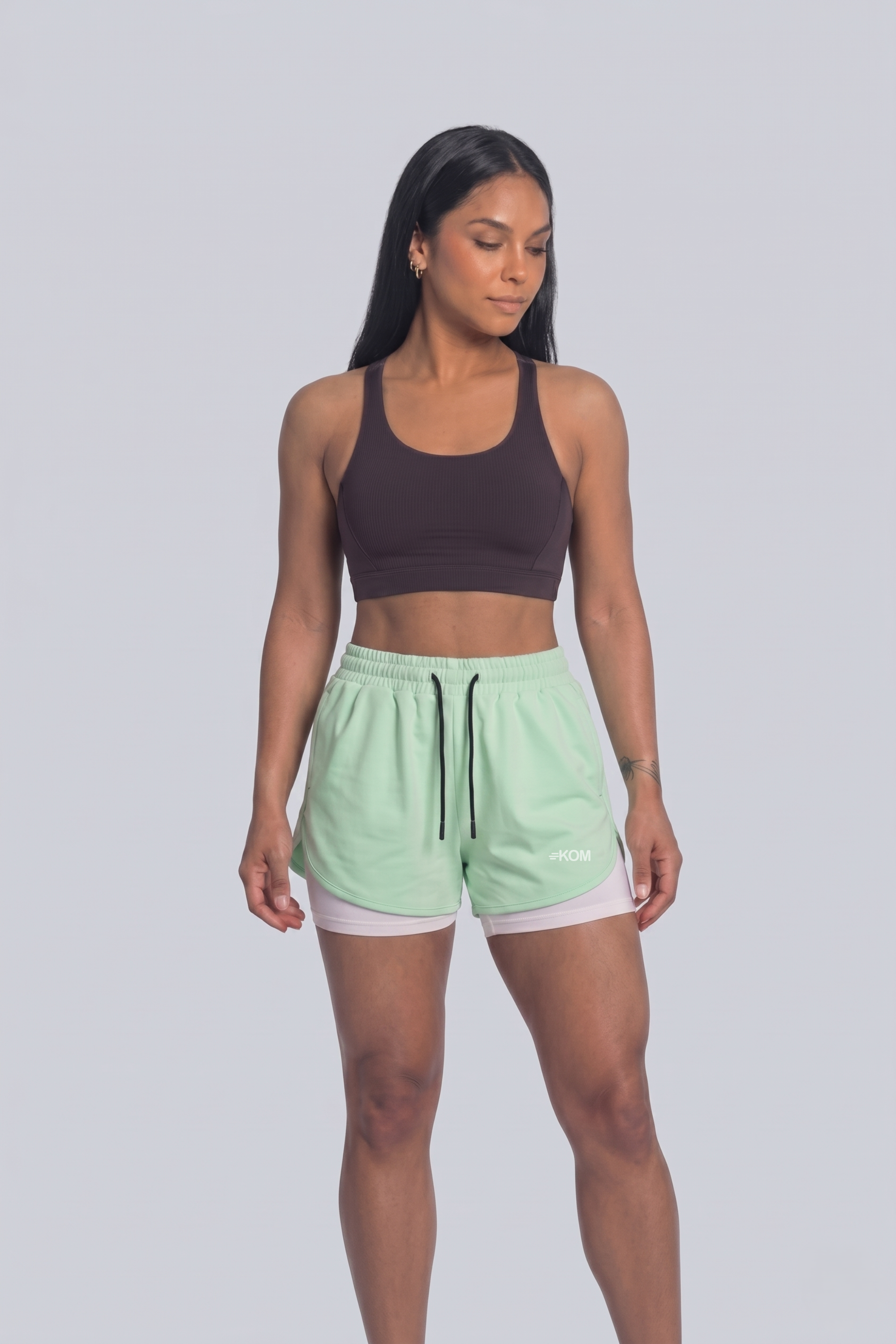 Short Running Deportivo Mujer Línea Giro con Boxer Interno y Bolsillos