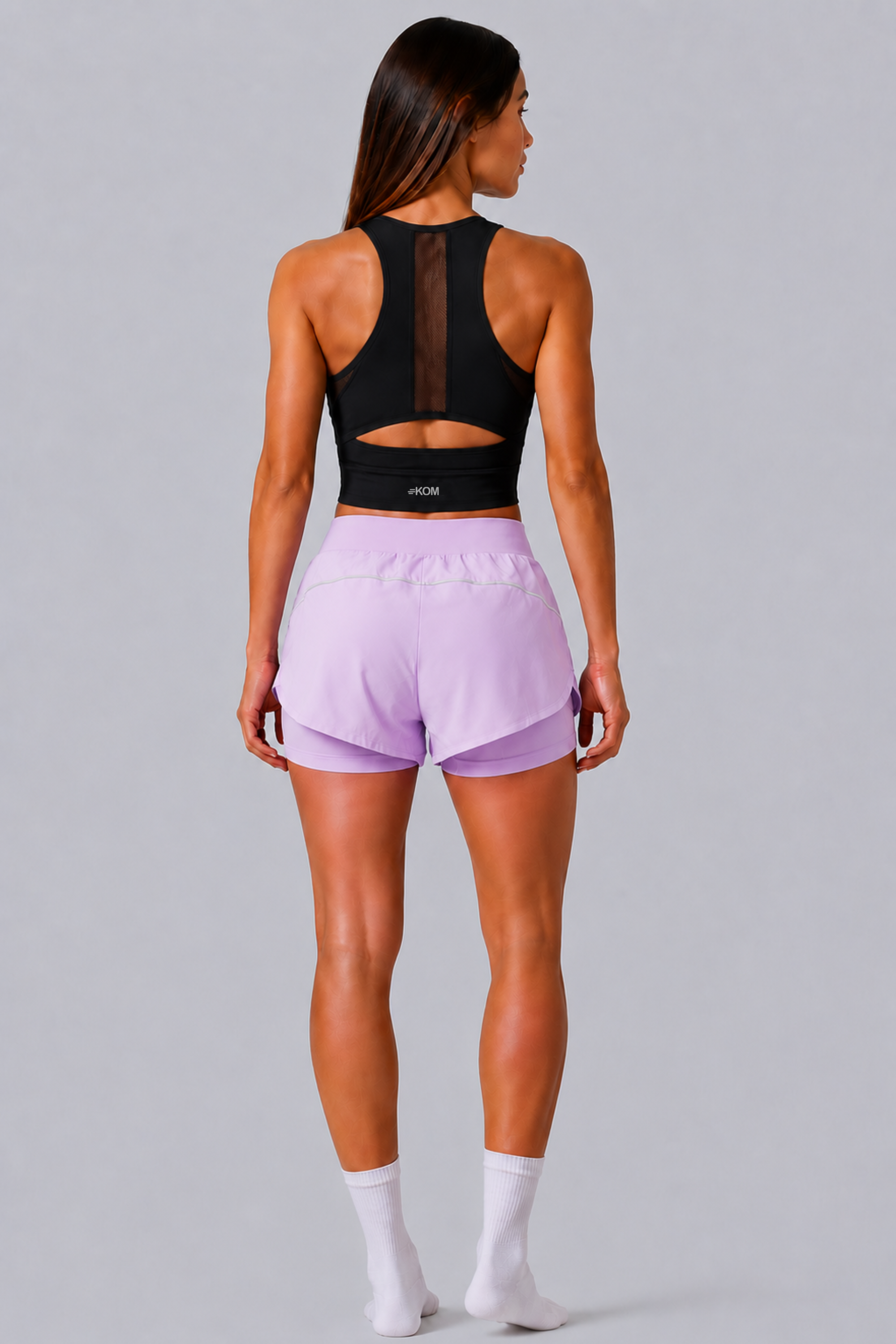 Short Running Deportivo Mujer Línea Giro PLUS con Boxer Interno y Bolsillos